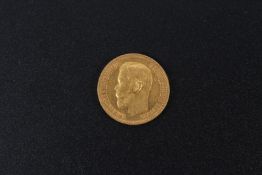 A gold five ruble coin, 1899.