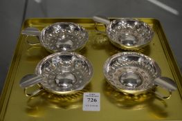 A set of four French wine tasters.