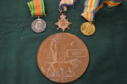 A set of three WWI medals and death penny awarded to 1682 Private Algernon Wyndham Freeman,