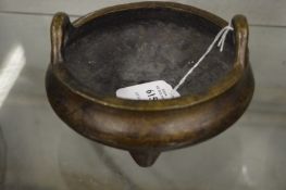 A Chinese bronze twin handled censer.