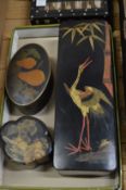 Three Japanese lacquer boxes and covers.