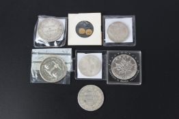 A collection of silver coins to include an Indo Chinese Piastre, 1815, a Canadian silver five dollar