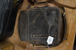 A vintage style leather shoulder bag.