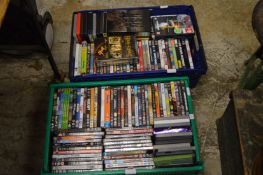 Two plastic crates of DVD's.