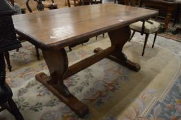 An oak refectory dining table.