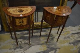 A pair of French style marquetry inlaid three drawer bedside tables.