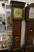 An 18th century oak longcase clock with eight day movement, the square brass dial signed A M