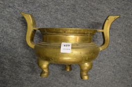 A Chinese bronze twin handled censer with six character mark to the base.