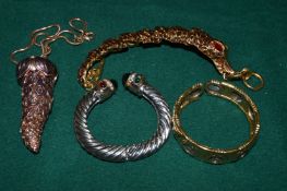 A collection of decorative bangles and other jewellery.