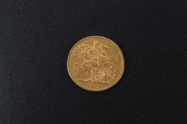 A gold sovereign, 1884.