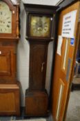 An 18th century oak cased longcase clock with thirty hour movement, the square brass dial saying