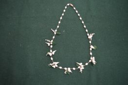 A decorative glass necklace.