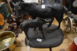 Cast iron group of a mare and fowl.