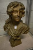 C Jacobs, Papillon, a painted Art Nouveau plaster bust of a woman, signed and dated 1913.