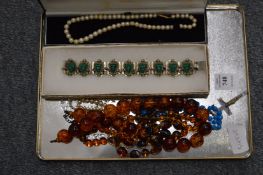 An Eastern white metal and jadeite bracelet and other jewellery.