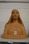 Continental terracotta bust of a woman inscribed and signed.