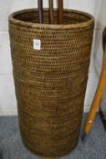 A wicker stick stand.