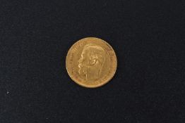 A gold five ruble coin, 1900.