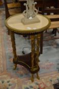 A good pair of French Empire style mahogany, marble and ormolu circular two-tier geuridons.