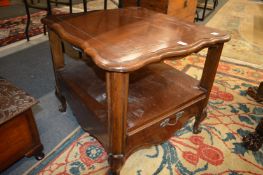 Modern hardwood two-tier single drawer lamp table.