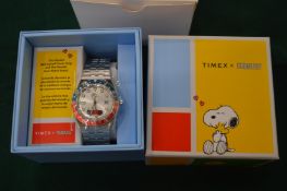 A Timex Peanuts wristwatch, with original box.