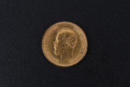 A gold ten ruble coin, 1902.