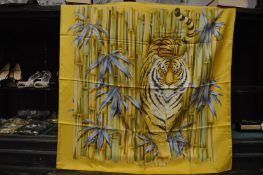 A Salvatore Ferragamo bamboo decorated silk scarf with original packaging.