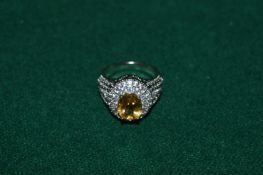 A 2.5ct natural citrine and silver ring with certificate.