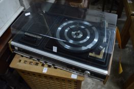 An Omex hi-fi system with speakers together with an early radio.