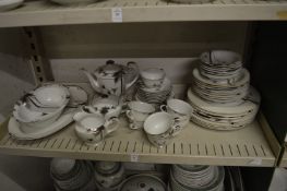 A Japanese part service decorated with bamboo.