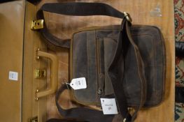 A vintage style leather shoulder bag.