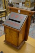 A Victorian oak country house letter box.