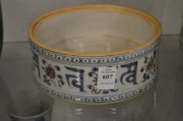 A Chinese blue and white decorated circular dish.