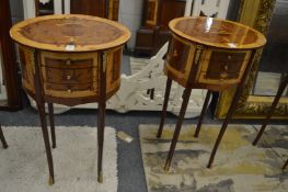 A pair of French style marquetry inlaid three drawer bedside tables.