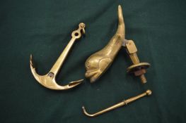 A model brass anchor and other items to include a dolphin door knocker.