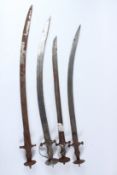 FOUR 19TH CENTURY INDIAN SWORDS. Longest 88cms.