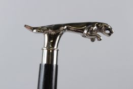 A WALKING STICK, the handle modelled as a Jaguar car mascot. 92cms long.