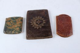 A COLLECTION OF THREE 19TH CENTURY OTTOMAN METAL THREAD EMBROIDERED LEATHER PURSES. 13cms high,