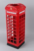A PAINTED CAST METAL STICK STAND in the shape of a telephone kiosk. 58cms high.