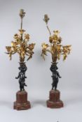 A GOOD PAIR OF BRONZE, ORMOLU AND ROUGE MARBLE CANDELABRA, fitted for electricity, with seven