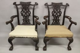 A VERY GOOD PAIR OF IRISH CHIPPENDALE MAHOGANY ARMCHAIRS CIRCA 1860, carved with oak leaves and