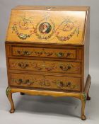 A SHERATON REVIVAL SATINWOOD AND PAINTED BUREAU, the fall flap with an oval portrait bust of a lady,