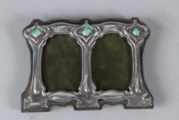 A MINIATURE SILVER AND ENAMEL DOUBLE PHOTO FRAME. 11cms wide x 8cms high