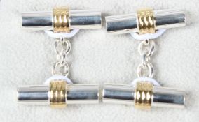 A PAIR OF STERLING SILVER BARREL CUFFLINKS.