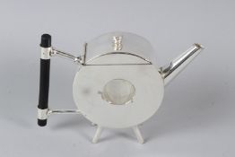 A CHRISTOPHER DRESSER STYLE PLATED CIRCULAR SHAPED TEAPOT. 20cms wide.