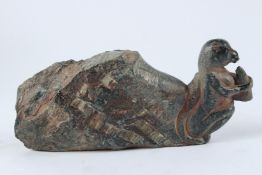 AN INDIAN CARVED GREEN HARDSTONE FIGURE, 19TH / 20TH CENTURY, modelled as the front end of a monkey.