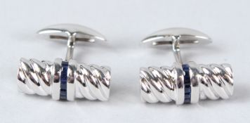 A PAIR OF STERLING SILVER, SAPPHIRE AND DIAMOND CUFFLINKS.