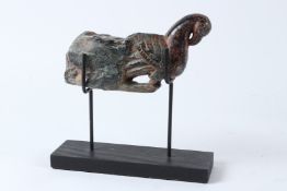 AN INDIAN CARVED GREEN HARDSTONE FIGURE, 19TH / 20TH CENTURY, modelled as the front end of a parrot.