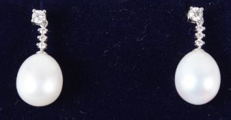 A PAIR OF 18CT WHITE GOLD, PEARL AND DIAMOND DROP EARRINGS.