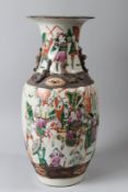 A LARGE 20TH CENTURY JAPANESE SATSUMA VASE painted with warriors on horseback. 44cms high.